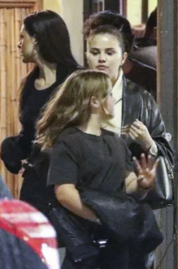 Saint Laurent Le 37 Bucket Bag worn by Selena Gomez in Beverly Hills on November 15, 2023