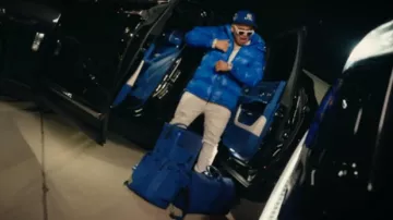 Dries Van Noten Blue Monogram Embossed Horizon 55 Luggage worn by Jesus Ortiz Paz in Sobras Y Mujeres by Fuerza Regida [Official Video]