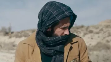 The plaid scarf worn by Master Sergeant John Kinley (Jake Gyllenhaal) in the movie The Covenant
