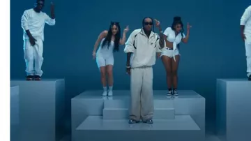 Nike Air Force 1 Low 'Metallic Chrome' sneakers worn by Tyga in Bops Goin Brazy (Official Video)