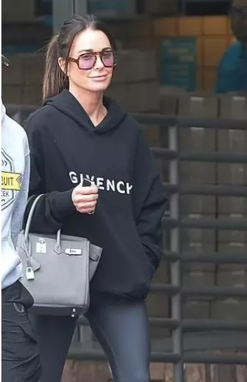 Givenchy Ar­che­type Hood­ie worn by Kyle Richards in Los Angeles post on  November 16, 2023