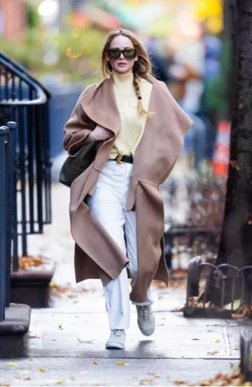 Adidas Gazelle Beige and Cloud White Sneakers worn by Jennifer Lawrence in New York City on November 22, 2023