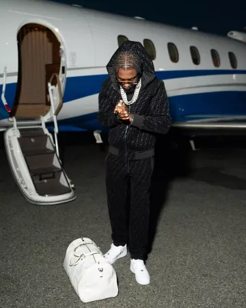 Goyard White Croisiere Bag worn by Lil Tjay on the Instagram account @liltjay