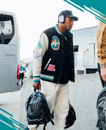 Veste OVO Miami Dolphins Black Varsity portée par Jalen Ramsey sur le compte Instagram @jalenramsey