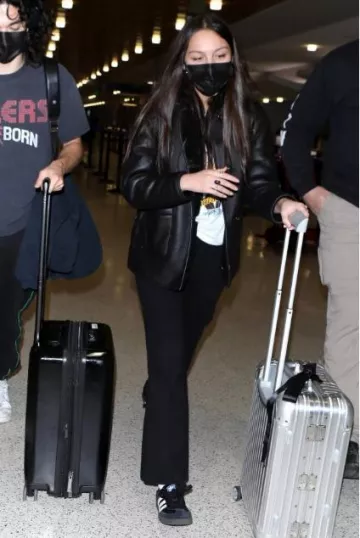 Rimowa Original Cabin Twist Suitcase worn by  Olivia Rodrigo in Milwaukee on November 23, 2023