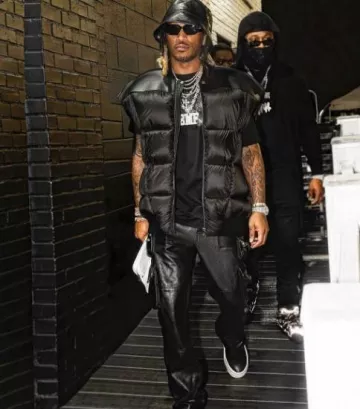 Amiri Black Leather Flared Tactical Cargo Pants worn by Future on the Instagram account @future