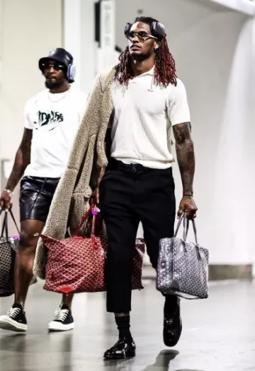 Goyard Grey Ambassade Bag worn by CeeDee Lamb on the Instagram account @cee2x___