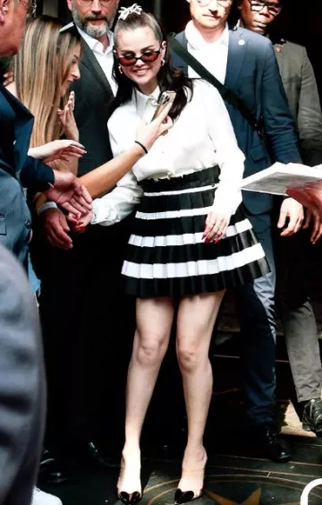 Jennifer Fisher Mul­ti Stack Ring worn by Selena Gomez at Rare Beauty Event in Paris post on June 8, 2023