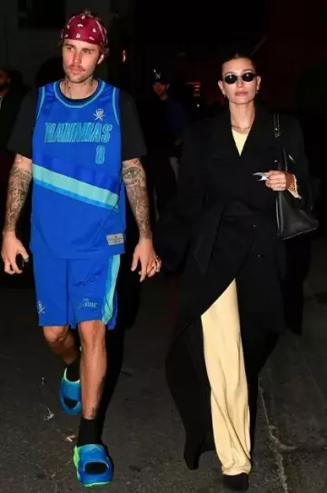 Saint Laurent Oversized Long-Sleeved Coat worn by  Hailey Bieber in Beverly Hills on November 30, 2023