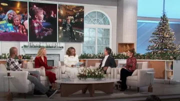 Christian Louboutin Lou Spikes Leather High-top Train­ers worn by Akbar Gbaja-Biamila as seen in The Talk on December 4, 2023