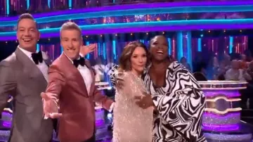 Karen Millen Embellished Fringe Caped Woven Mini Dress worn by Shirley Ballas as seen in Strictly Come Dancing: It Takes Two (S21E02)