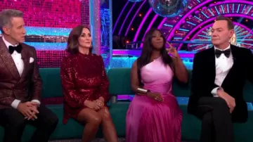 Mango Clau­di Asym­met­ric Pleat­ed Dress worn by Motsi Mabuse as seen in Strictly Come Dancing: It Takes Two (S21E04)