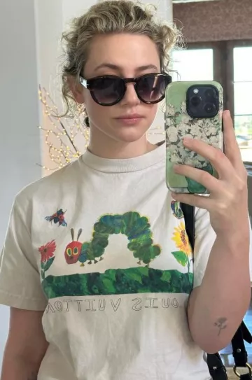 Eyewear by David Beckham Db 7110/S Sunglasses worn by Lili Reinhart on her Instagram Story on December 6, 2023