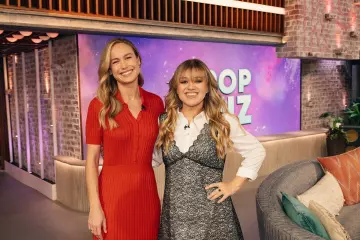 Gabriela Hearst Amor Silk And Cashmere Midi Dress worn by Brie Larson at The Kelly Clarkson Show on December 4, 2023
