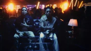 Amiri Brown Bandana Silk Keychain worn by Ozuna in La Propuesta (Video Oficial) con El Rubio Acordeón
