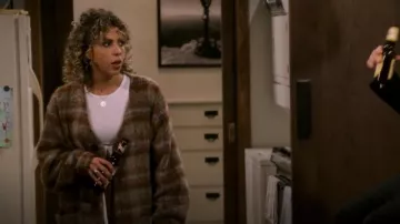 Our Legacy Brown Check Cardi­gan worn by Eve (Jess Salgueiro) as seen in Frasier (S01E10)