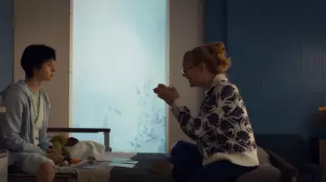 Benetton Flo­ral Cardi­gan worn by Pam (Marnie McPhail) as seen in Orphan Black: Echoes (S01E03)