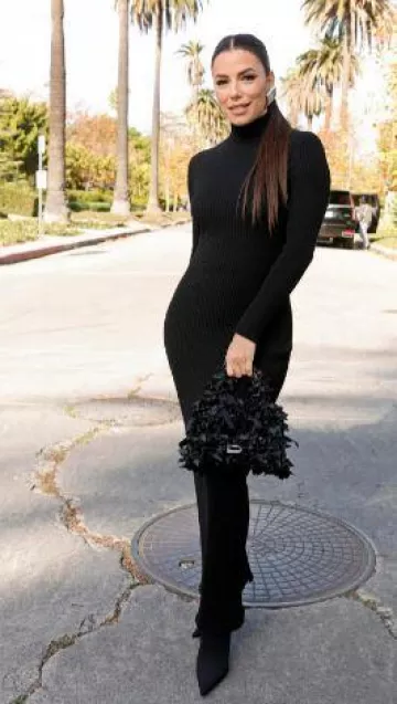 Balenciaga Hour­glass Xs Bag with Satin Bows worn by Eva Longoria at  Balenciaga Fashion Show post on December 2, 2023