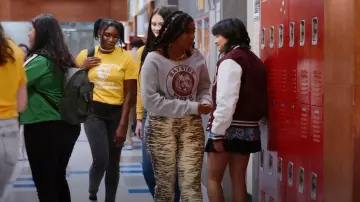 Ganni High Waist Ze­bra Print Straight Leg Jeans worn by Aisha Garcia (Alycia Pascual-Pena) as seen in Saved by the Bell (S02E10)
