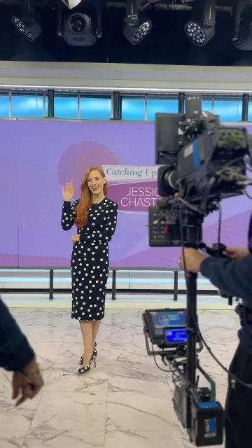 Carolina Herrera Polka Dot Midi Skirt worn by Jessica Chastain in New York City on December 14, 2023