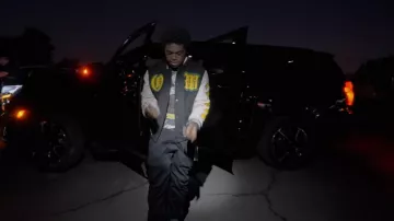 Off-White Black & Yellow Troll Patch Varsity Jacket of Kodak Black in Facetime Hiding [Official Music Video]