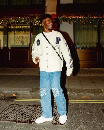 Off-White Cream Moon Knit Varsity Cardigan worn by Bukayo Saka on the Instagram account @bukayosaka87
