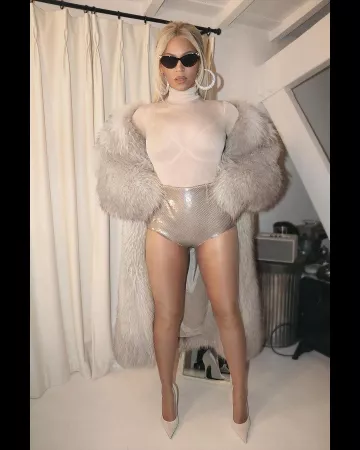 Prada Gazar Semi-Sheer Jersey Bodysuit worn by Beyoncé on her Instagram on December 16, 2023