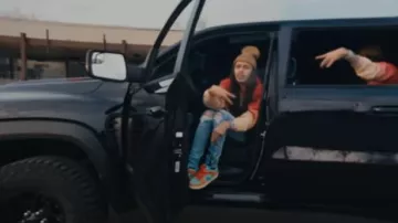 Zapatillas Nike Dunk Low 'Orange Emerald Rise' usadas por BabyTron en Stutter Flow (Video oficial)