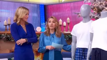 Ann Taylor Bow Tie Blouse In Marina Blue worn by Lori Bergamotto as seen in Good Morning America on December 13, 2023