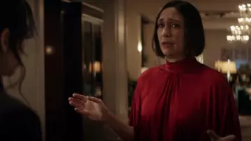 Valentino Red Cape Ef­fect Jer­sey Gown worn by Eleanor Bishop (Vera Farmiga) as seen in Hawkeye (S01E02)
