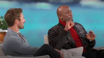 Guess Fulham Velvet Embroidered Zip-Front Bomber Jacket worn by Akbar Gbaja-Biamila as seen in The Talk on December 15, 2023