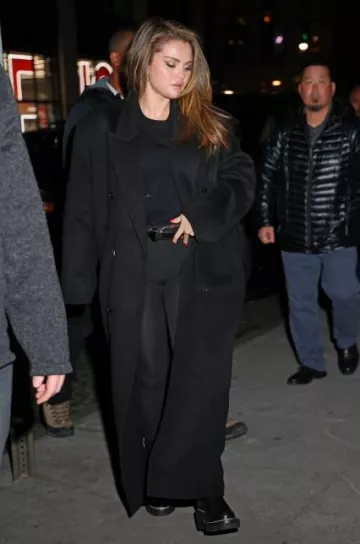 The Frankie Shop Del­phi­na Coat worn by Selena Gomez in NYC on December 12, 2023