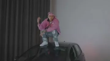 The North Face Light Pink '1996 Nuptse' Puffer Jacket worn by Central Cee in Central Cee - Entrapreneur [Music Video]