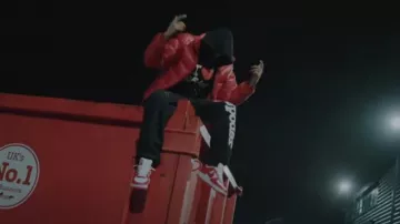 Nike x NOCTA Red Puffer Jacket worn by Central Cee in Entrapreneur [Music Video]