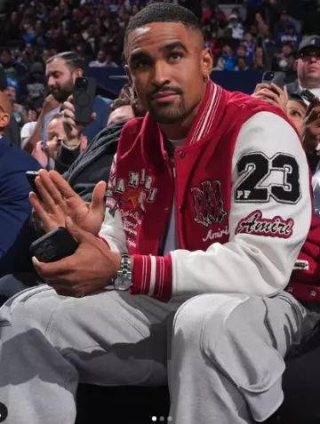 Amiri Red Vintage Tiger Varsity Jacket worn by Jalen Hurts on the Instagram account @jalenhurts