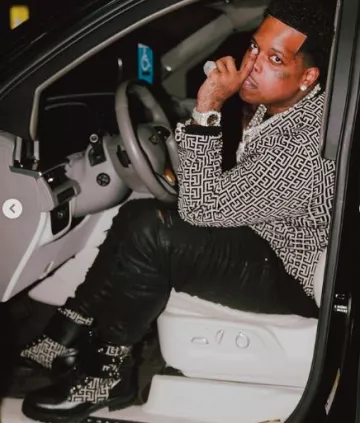 Bottes Balmain White Monogram & Black Leather 'Phil Ranger' portées par Finesse2tymes sur le compte Instagram @1finesse2tymes