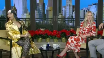 Dolce & Gabbana Crinkled Metallic Trench Coat with Belt worn by Nicki Minaj as seen in LIVE with Kelly and Mark on December 20, 2023
