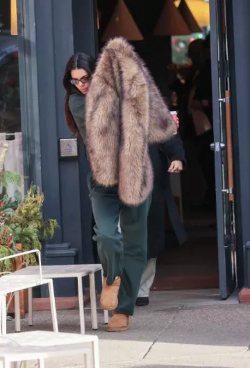 Ugg Classic Ultra Mini Boots in Chestnut worn by Kendall Jenner in Aspen on December 18, 2023