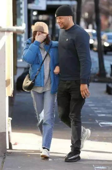 Prada Arque Leather Shoulder Bag worn by Aubrey Plaza in New York City on December 20, 2023