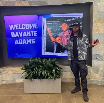 Jordan 1 Retro Low x Travis Scott Black Phantom worn by Davante Adams on the Instagram account @taeadams
