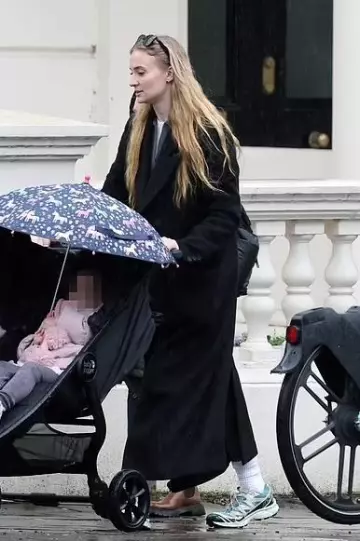 Ray Ban Classic Wayfarer Sunglasses worn by Sophia Turner in London on December 20, 2023