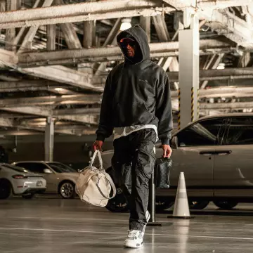 Givenchy Black Nylon Inner-Zip Cargo Pants worn by Davante Adams on the Instagram account @taeadams