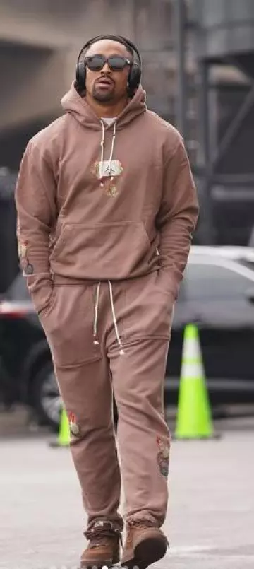 Jordan x Travis Scott Brown Cactus Patch Hoodie worn by Jalen Hurts on the Instagram account @jalenhurts