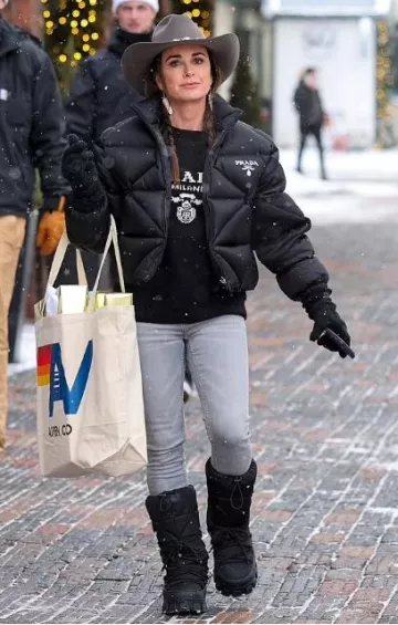 Prada Nylon Gabardine Apres Ski Boots worn by Kyle Richards in Aspen on December 24, 2023