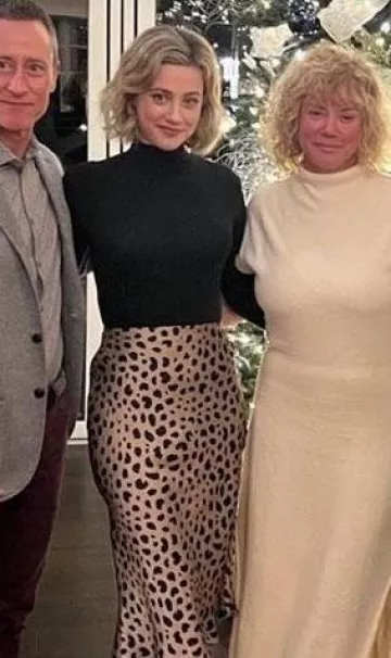 Realisation Par Naomi Skirt in Wild Things worn by Lili Reinhart at Christmas Eve on December 24, 2023