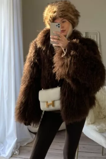 Hermès Constance 1-24 Nata Epsom Gold Hardware worn by Leonie Hanne on her Instagram Story on December 28, 2023