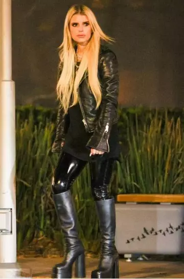 Versace Leather Pants in Black & Grey worn by Jessica Simpson on her  Instagram on November 24, 2023