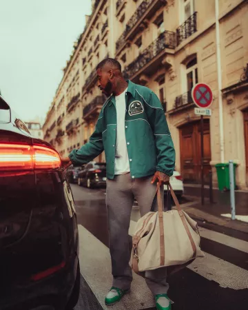 Louis Vuitton Green & Grey LV Trainer Sneakers worn by Presnel Kimpembe on the Instagram account @kimpembe3
