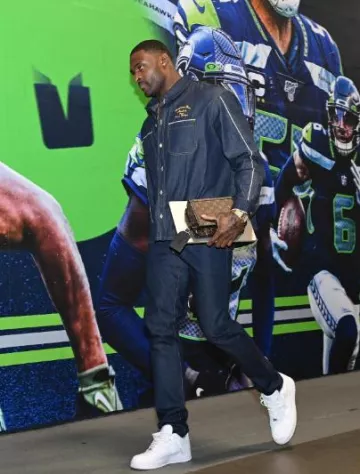 Dior Deep Indigo Dior Atelier Denim Shirt worn by DK Metcalf on the Instagram account @dk14