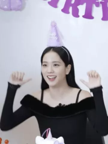 Blumarine Off The Shoulder Faux Fur Knit Top worn by Jisoo on her Youtube post on January 2, 2024